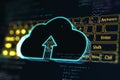 Cloud computing and storage, digital service concept with dark cloud symbol with arrow inside on blurred yellow keyboard
