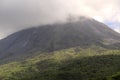Cloud covered Arenal volcano national park in Costa Rica Royalty Free Stock Photo