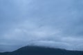 Cloud covered mountian tops and Windmills at Sunrise at Chalkewadi Platue in Satara,Maharashtra,India Royalty Free Stock Photo