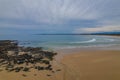 A cloud covered winters day at Broulee Beach