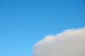 Cloud with curved growing edge in blue sky Royalty Free Stock Photo