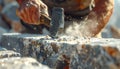 Craftsmans Hands Breaking Stone with Hammer Royalty Free Stock Photo
