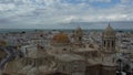 Cloud-enshrouded Cadiz cathedral close up: 4K Drone Vision, Spain