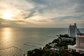 Cloud-filled sunset sky over the coastal city of Pattaya, Thailand.