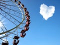 Cloud in the form of hearts and a Ferris wheel Royalty Free Stock Photo