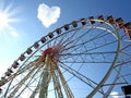 Cloud in the form of hearts and a Ferris wheel Royalty Free Stock Photo