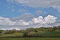 Clouds above hill