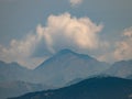 Cloud Formation Behind Mountain Peak Royalty Free Stock Photo