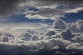 Dramatic clouds form in a blue sky. Royalty Free Stock Photo
