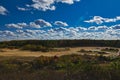 Cloud front over an open quarry