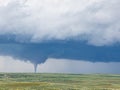 Cloud funnel over a green landscape in the north of Casper, Wyoming Royalty Free Stock Photo