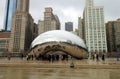 Cloud gate at Chicago Illinois Bean mirror art with people and buildings mirrored tourist landmark at this mayor USA city. Royalty Free Stock Photo