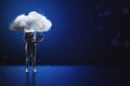 Cloud headed hacker with laptop standing on abstract blue bokeh interior background with mock up place. Sky is the limit,