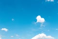 Cloud heart shaped patterns on bright blue sky summer background Royalty Free Stock Photo