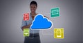 Cloud icon over network of icons against smiling african american woman doing time break gesture Royalty Free Stock Photo