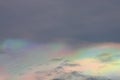 Cloud iridescence phenomenon on sunset sky