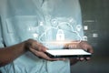 A cloud with a lock hologram above a tablet, symbolizing cloud Royalty Free Stock Photo