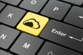 Cloud networking concept: Cloud on computer keyboard background Royalty Free Stock Photo