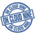 ON CLOUD NINE written word on blue stamp sign