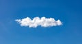 Cloud, one single white on clear blue sky, sunny spring day Royalty Free Stock Photo