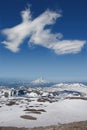 The cloud over Vilyuchinsky volcano shaped like a giant dragon, view from the slope of Gorely volcano, Kamchatka Peninsula