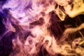 Cloud of pink , blue and purple smoke on a black isolated background. Background from the smoke of vap Royalty Free Stock Photo