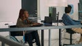 Cloud programmer in wheelchair using server data to create software app Royalty Free Stock Photo