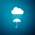 Cloud with rain drop on umbrella icon isolated on blue background Royalty Free Stock Photo