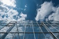 The cloud reflected in the window glass of the building, space for text Royalty Free Stock Photo