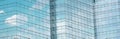 Cloud reflected in windows of modern office building Royalty Free Stock Photo