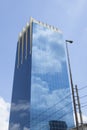 Cloud reflection on glass facade of building Royalty Free Stock Photo