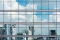 Cloud reflection in high glass offices. Blue reflection of the s Royalty Free Stock Photo