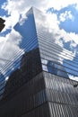 Clouds Reflect on the Building Glass Walls of the Skyscrapers in Manhattan, New York City. Royalty Free Stock Photo