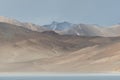 Cloud shadow on mountain range stand by lake Royalty Free Stock Photo