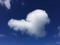 Cloud in Shape of Heart above Pacific Ocean - View from Kalalau Trail on Na Pali Coast on Kauai Island, Hawaii. Royalty Free Stock Photo