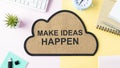 Cloud-shaped board with Make Ideas Happen Royalty Free Stock Photo