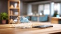 Cloud-shaped hologram projected above a wooden desk, displaying network and
