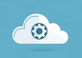 Cloud-shaped icon with a gear symbol inside, set against a blue background Royalty Free Stock Photo