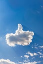 Bird-Shaped Cloud Flying in Blue Sky Royalty Free Stock Photo