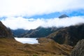 Cloud shrouded mountains and Lake Harris, Routeburn Track, New Zealand