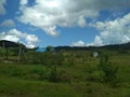 CLOUD SKY IN GREEN SAVANA HILL PAPUA INDONESIA