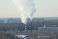 Cloud of smoke rising up from indastrial chimney