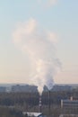 Cloud of smoke rising up from indastrial chimney