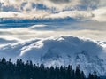 cloud & snow covered mountain