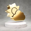 Cloud Sun icon. Shiny golden Cloud Sun symbol on white marble podium Royalty Free Stock Photo