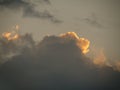 Cloud at sunset, red silver lining. Royalty Free Stock Photo