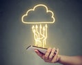 Cloud technology. Closeup of a hand with smartphone Royalty Free Stock Photo