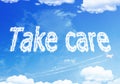 Cloud text : TAKE CARE on the sky. Royalty Free Stock Photo