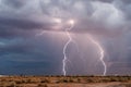 Cloud to ground lightning bolt strikes from a storm in Arizona Royalty Free Stock Photo