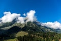 Cloud on the top of mountain Royalty Free Stock Photo